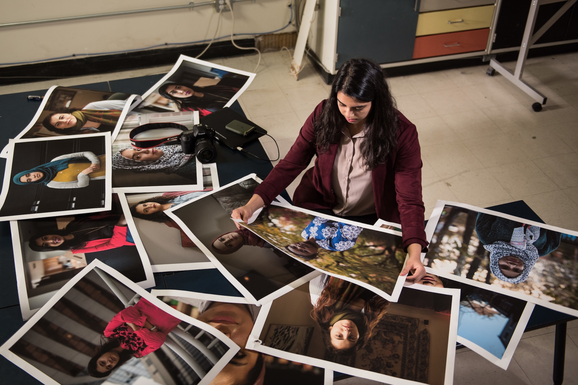 A photojournalism student takes photos