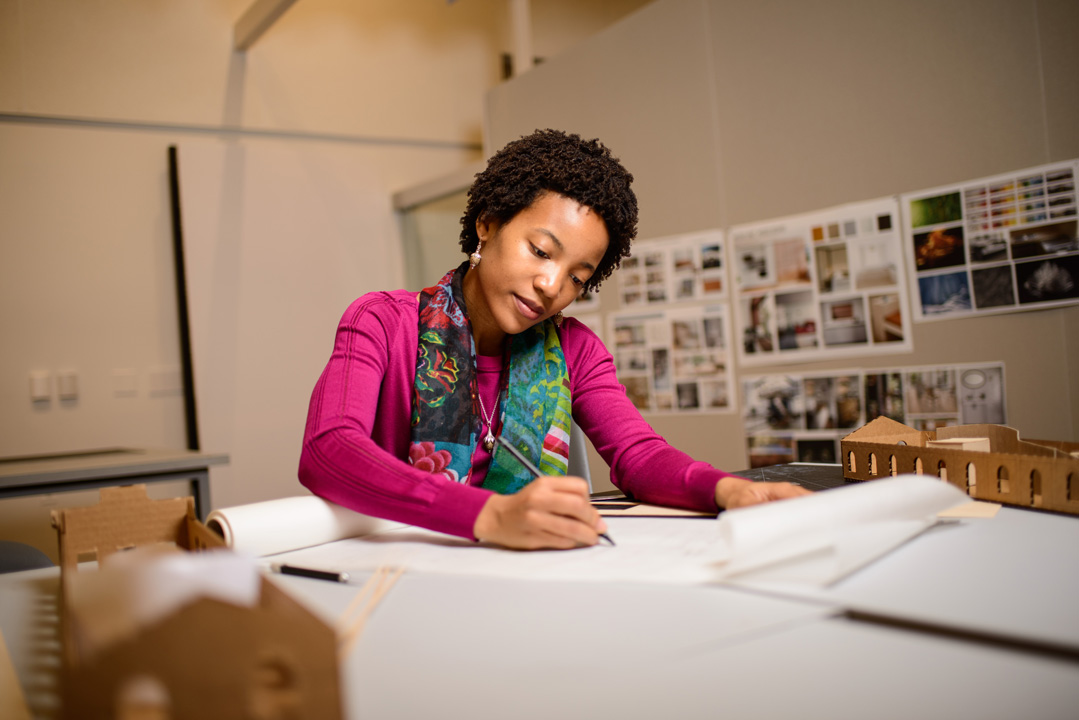 A student works in one of Corcoran's classrooms
