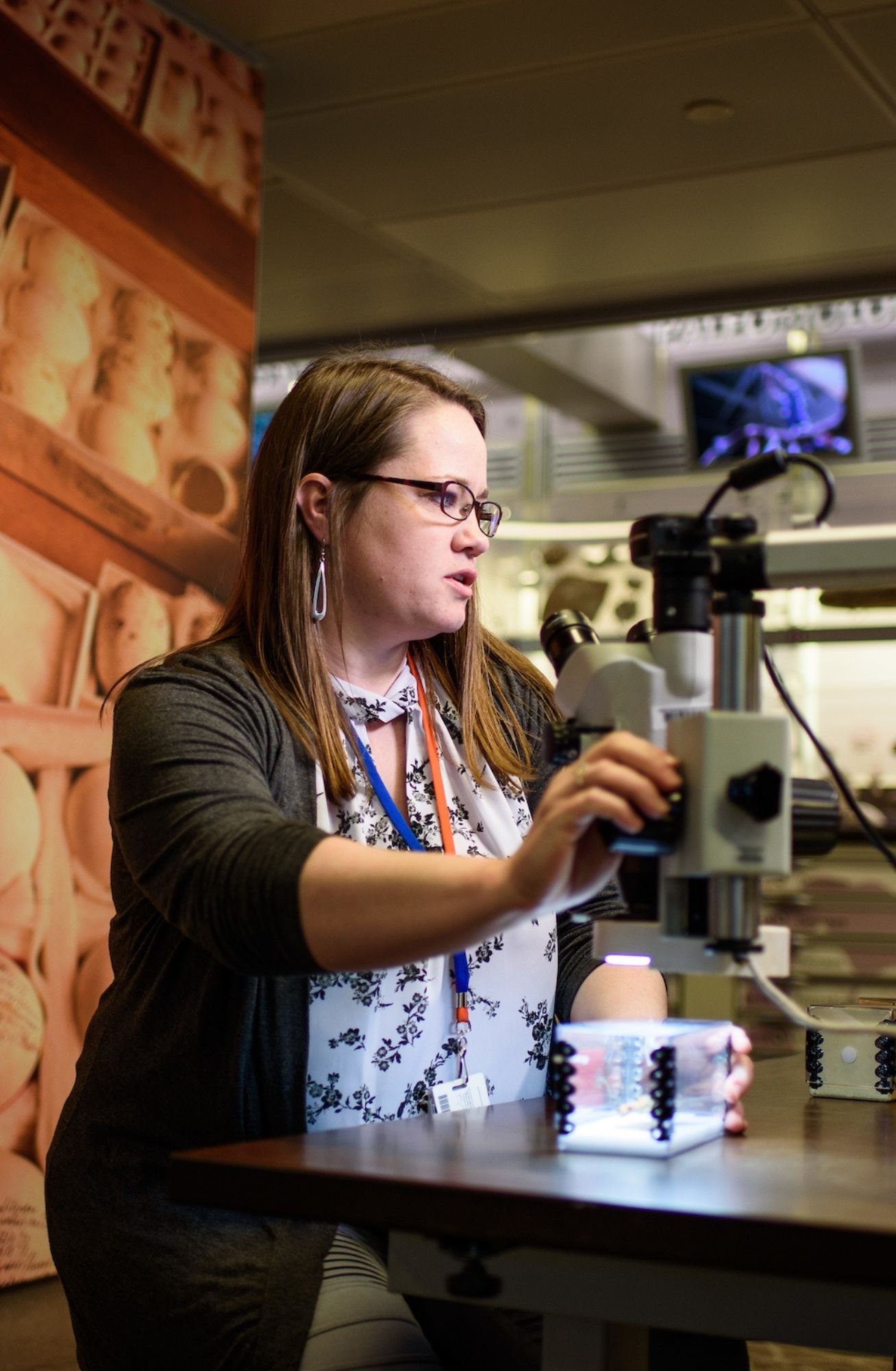 Woman using technology to look at art