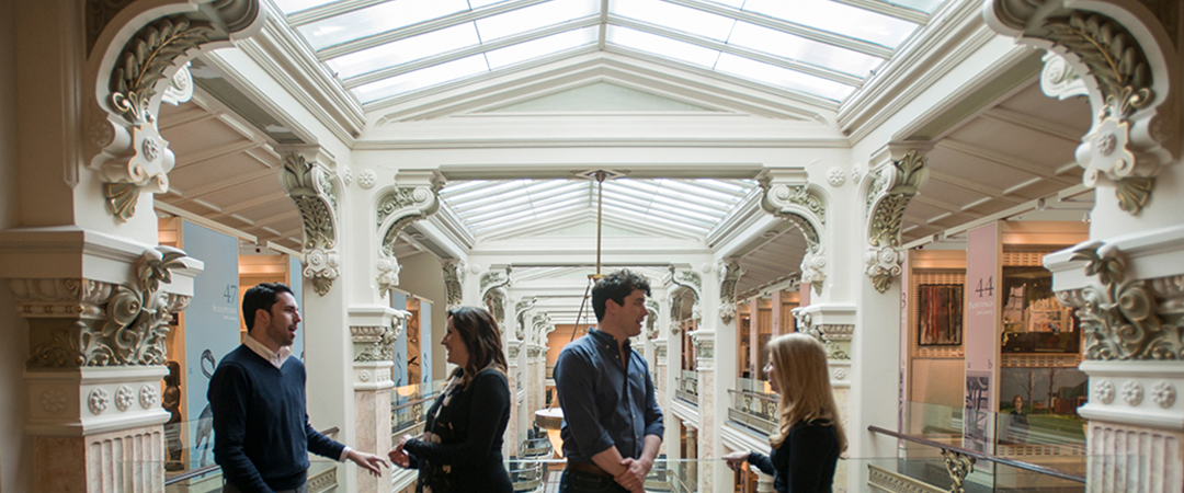 STUDENTS TALKING IN MUSEUM