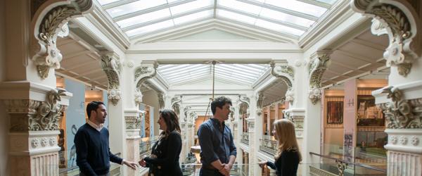 STUDENTS TALKING IN MUSEUM